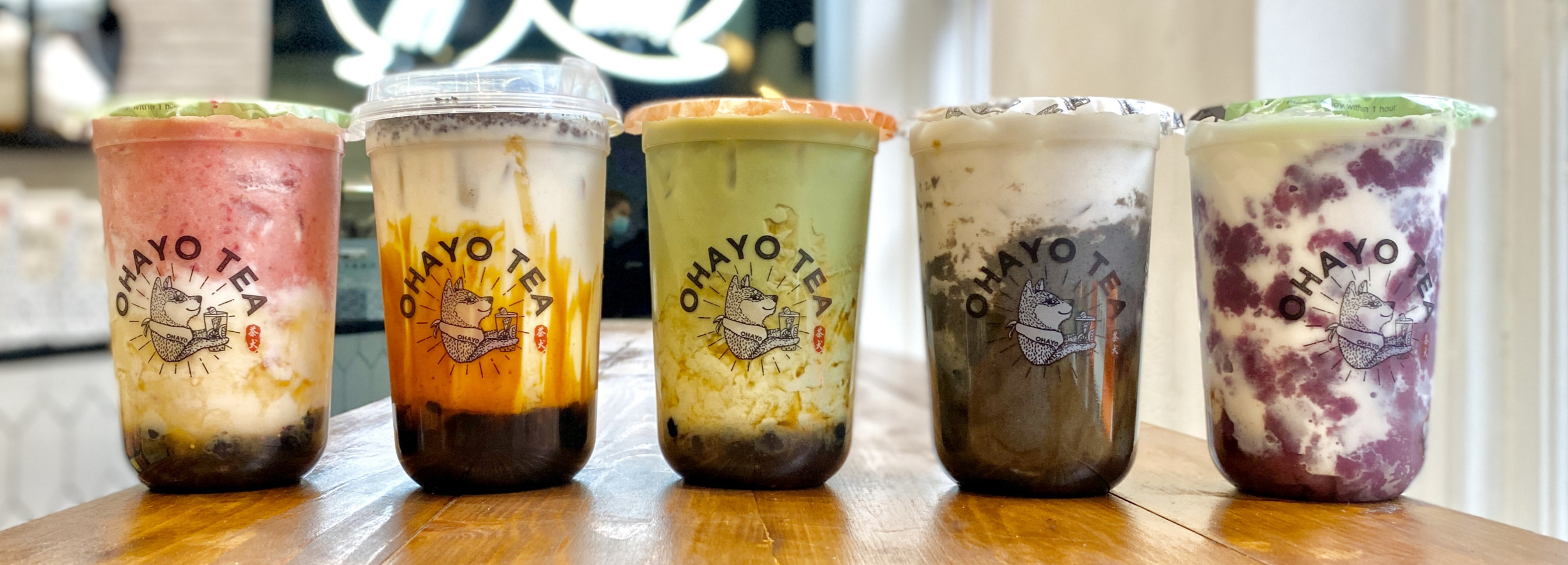Multiple cups of bubble tea lined up
